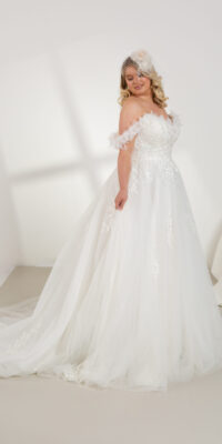 Plus size wedding dresses by wholesale in London, designer made for perfect bridal look.